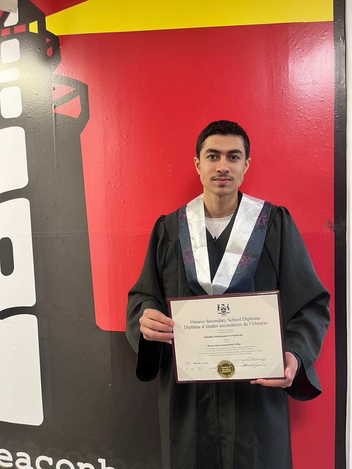 Beaconhouse graduate with certificate — photograph 12